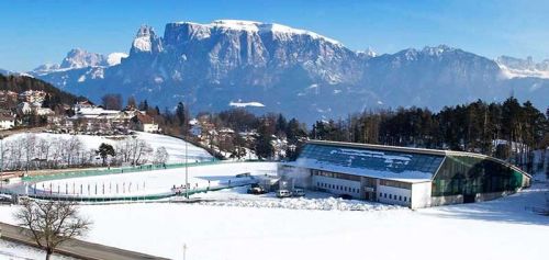 a view of the Ritten Arena, in the shadow of the Italian Alps